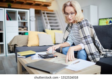 Portrait Of Contemporary Mature Woman Calculating Finances And Planning Budget While Paying Bills, Copy Space