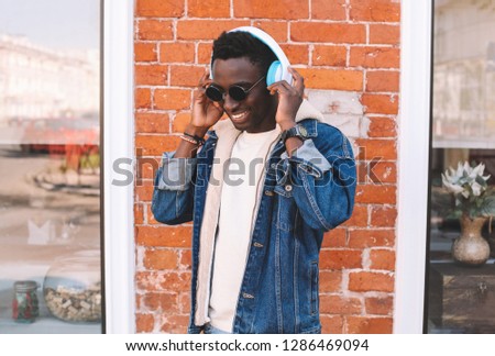 Young black man listening to music