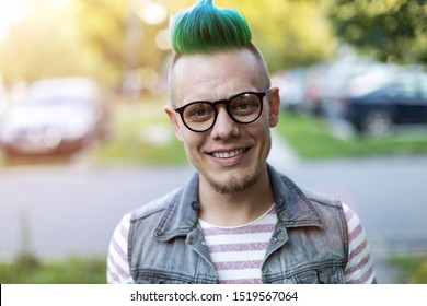 Portrait Of A Cool Young Man With Pink Mohawk
