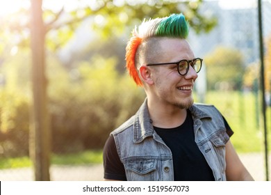 Portrait Of A Cool Young Man With Pink Mohawk
