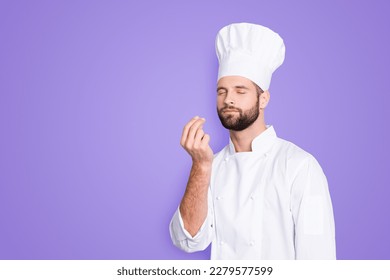 Portrait with copyspace, empty place for advertisement, product of attractive chef cook in beret with close eyes, white outfit making bellisimo symbol, sign with fingers, isolated on grey background - Shutterstock ID 2279577599