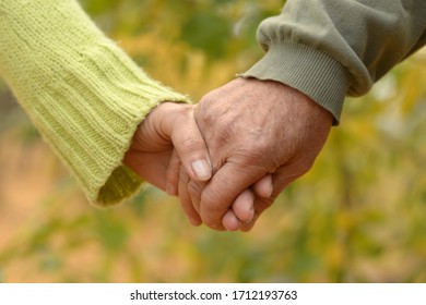 Portrait Of A Couple Holding Hands, Close Up