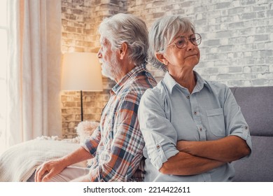 Portrait Of Couple Of Two Old Seniors Arguing And Looking Other Sides After Fighting. Woman And Man Back To Back Tired And Thinking On Separation.