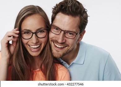 Portrait Of Couple Wearing Glasses, Studio