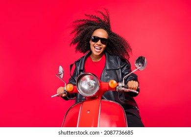 Portrait Of Crazy Funny Funky Person Driving Fast Speed Bike Have Fun Isolated On Red Color Background