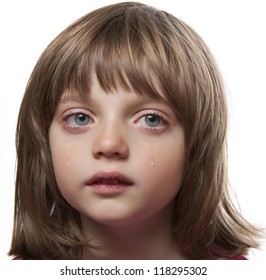 portrait of a crying little girl - white background