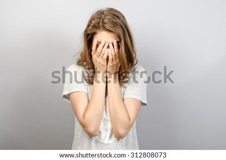 portrait of a crying young  lonely woman