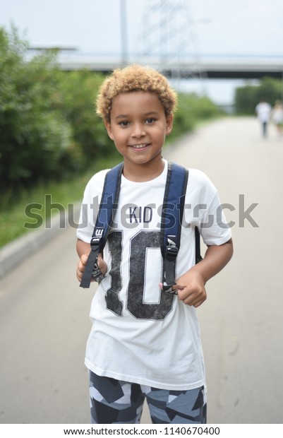 Download Portrait Cute African American Boy Who Stock Photo Edit Now 1140670400