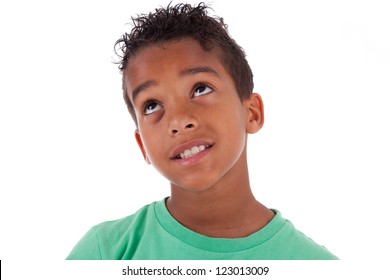 Portrait Of A Cute African American Little Boy Looking Up, Isolated On White Background