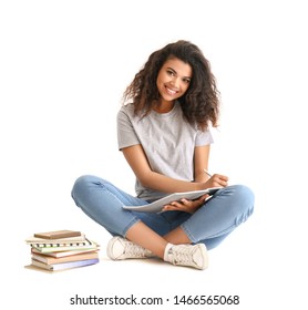 Portrait Of Cute African-American Student On White Background