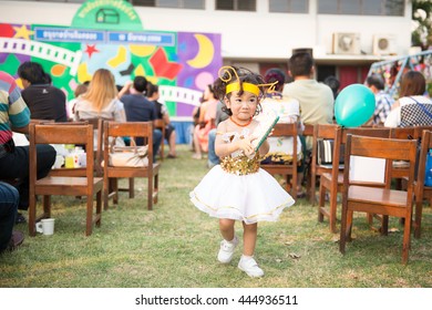 Portrait Of Cute Asian Girl With Fancy Costume At School Event