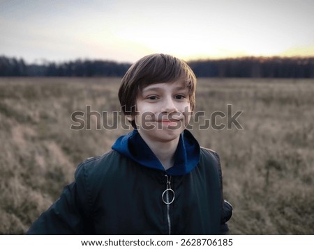 Portrait cute caucasian boy, Teen guy in nature camping concept.