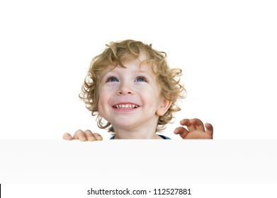 Portrait Of A Cute Child Looking Up And Laughing