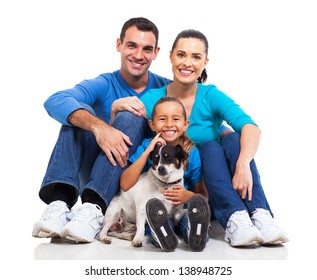 Portrait Of Cute Family Sitting On Floor With Their Pet Dog Isolated On White