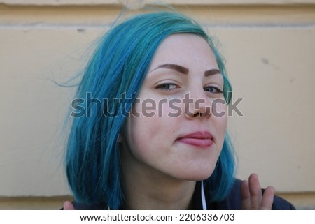 Similar – Image, Stock Photo Portrait of a laughing young woman with turquoise hair