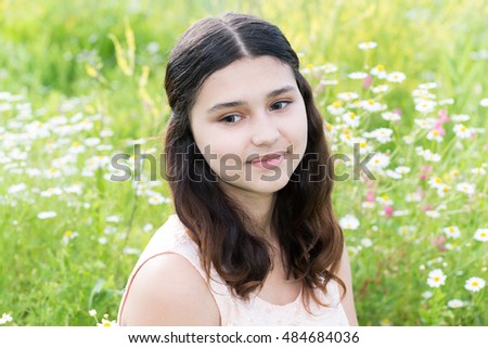 Portrait of cute girl with hairstyle of long hair on the outside