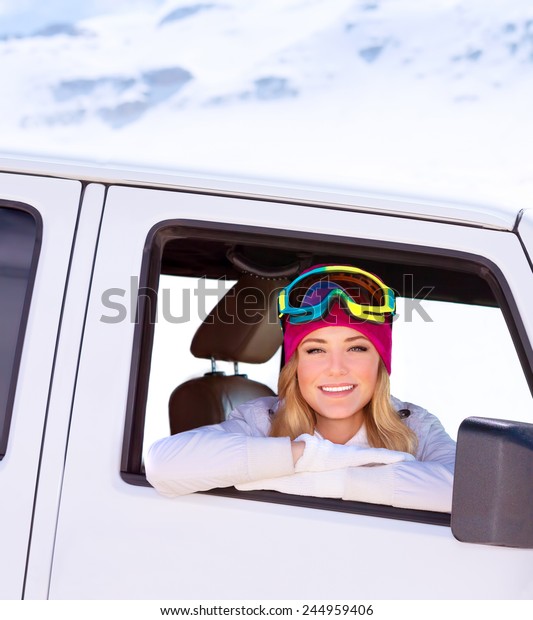 Portrait of\
cute happy woman in the car going to the ski resort, active\
lifestyle, enjoying winter vacation\
concept