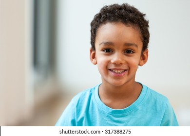 Portrait Of A Cute Little African American Boy Smiling