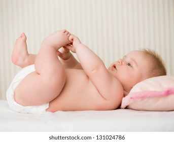 Portrait Of A Cute Little Baby Lying