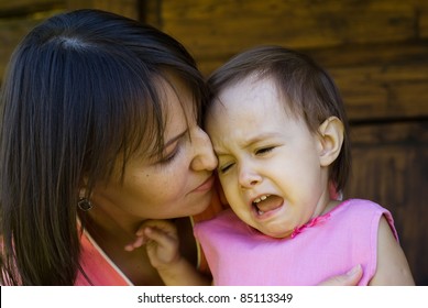 Portrait Of A Cute Mom Posing With Daughter