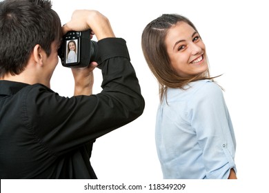 Portrait Of Cute Teen Model Posing In Front Of Photographer.Isolated On White.