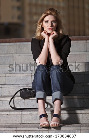 Similar – Image, Stock Photo Blonde girl wearing white sweater smiling in the street