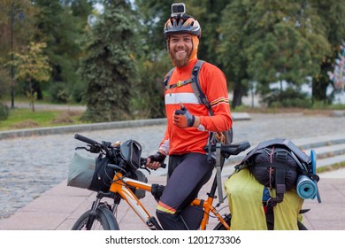 Portrait Of A Cyclist With Helmet And Smiling