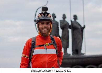 Portrait Of A Cyclist With Helmet And Smiling