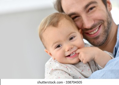 Portrait Of Daddy With Baby Girl