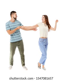 Portrait Of Dancing Young Couple On White Background