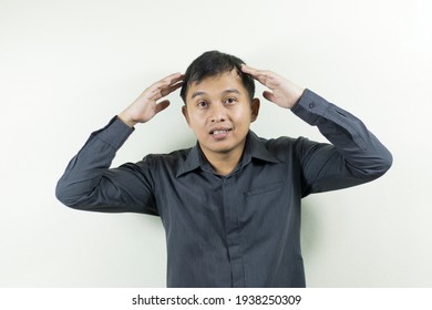 Portrait Of A Dark-skinned Asian Man In Business Attire, A Man With Slight Hair Loss.