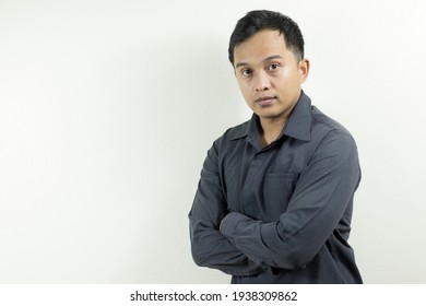 Portrait Of A Dark-skinned Asian Man In Business Attire, A Man With Slight Hair Loss.