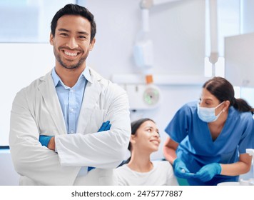 Portrait, dentist and nurse for oral health, dental care and hygiene in office or consultation in clinic. Man, arms crossed and smile as medic or doctor in hospital for treatment of teeth or mouth - Powered by Shutterstock