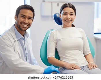 Portrait, dentist and patient in clinic for consultation, oral hygiene or medical procedure. Service, examination and doctor man with happy client for teeth whitening, orthodontics or dental care - Powered by Shutterstock