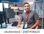 Portrait of developer programming IT technology career. Young adult indian programmer coding typing keyboard in modern office. Productivity data coder software development. Overtime work employee