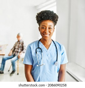 Portrait Of A Doctor Or Nurse Caregiver With Senior Woman At Home Or Nursing Home