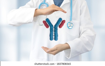 portrait of doctor showing monoclonal antibodies