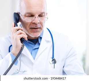 Portrait Of A Doctor Talking On The Phone