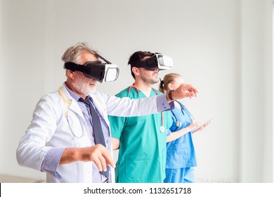 Portrait Of Doctor Team Are Using Virtual Reality Technology To Examination Physical Body Patient., Technology And Occupational Concept.