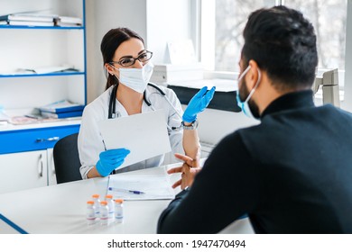 Portrait Of A Doctor Woman In A Protective Mask, Cardiologist, Vaccine, Doctor's Consultation. Medicine, Health, Infection.