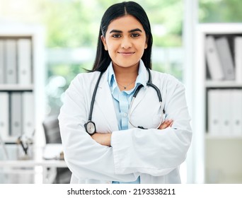 Portrait Of A Doctor Working In Her Office With Medical Equipment At A Modern Surgery Center. Happy Healthcare Worker Standing With A Stethoscope In Hospital After A Health And Wellness Consultation