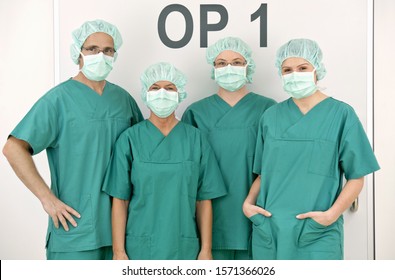 Portrait of doctors and nurses wearing scrubs and surgical masks