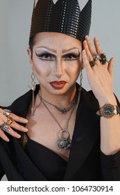 Portrait Of Drag Queen In Black With A Black Crown, Man Dressed As Woman