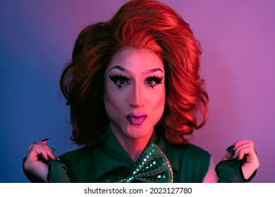 Portrait of drag queen on colored background looking into the camera  - Shutterstock ID 2023127780