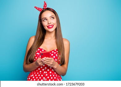 Portrait of dream dreamy bright girl use smartphone blogging think thoughts about social media post comments wear headband lifestyle vintage dress isolated over blue color background