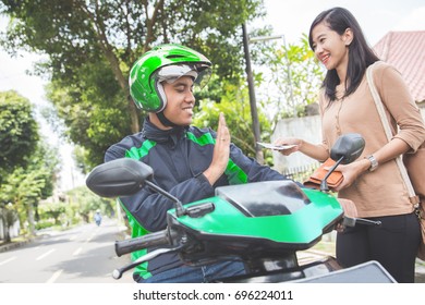 Portrait Of A Driver Refuse To Take Money Cash From Customer