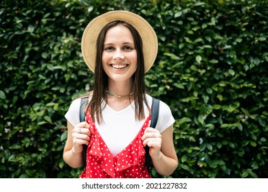 Portrait Eastern European Hipster Woman Looking At Camera - Happy Ukrainian Tourist Female Wearing A Hat Standing Against Natural Background - Happiness Lifestyle Concept