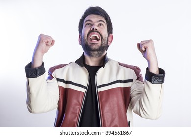 Portrait Of Eccentric Crazy Man Pulling His Hair And Making Funny Gestures