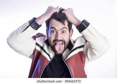 Portrait Of Eccentric Crazy Man Pulling His Hair And Making Funny Gestures