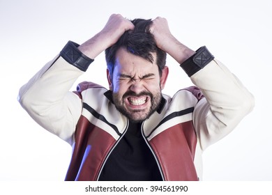 Portrait Of Eccentric Crazy Man Pulling His Hair And Making Funny Gestures